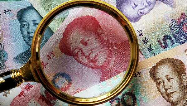 Китай ослабил курс юаня до очередного минимума